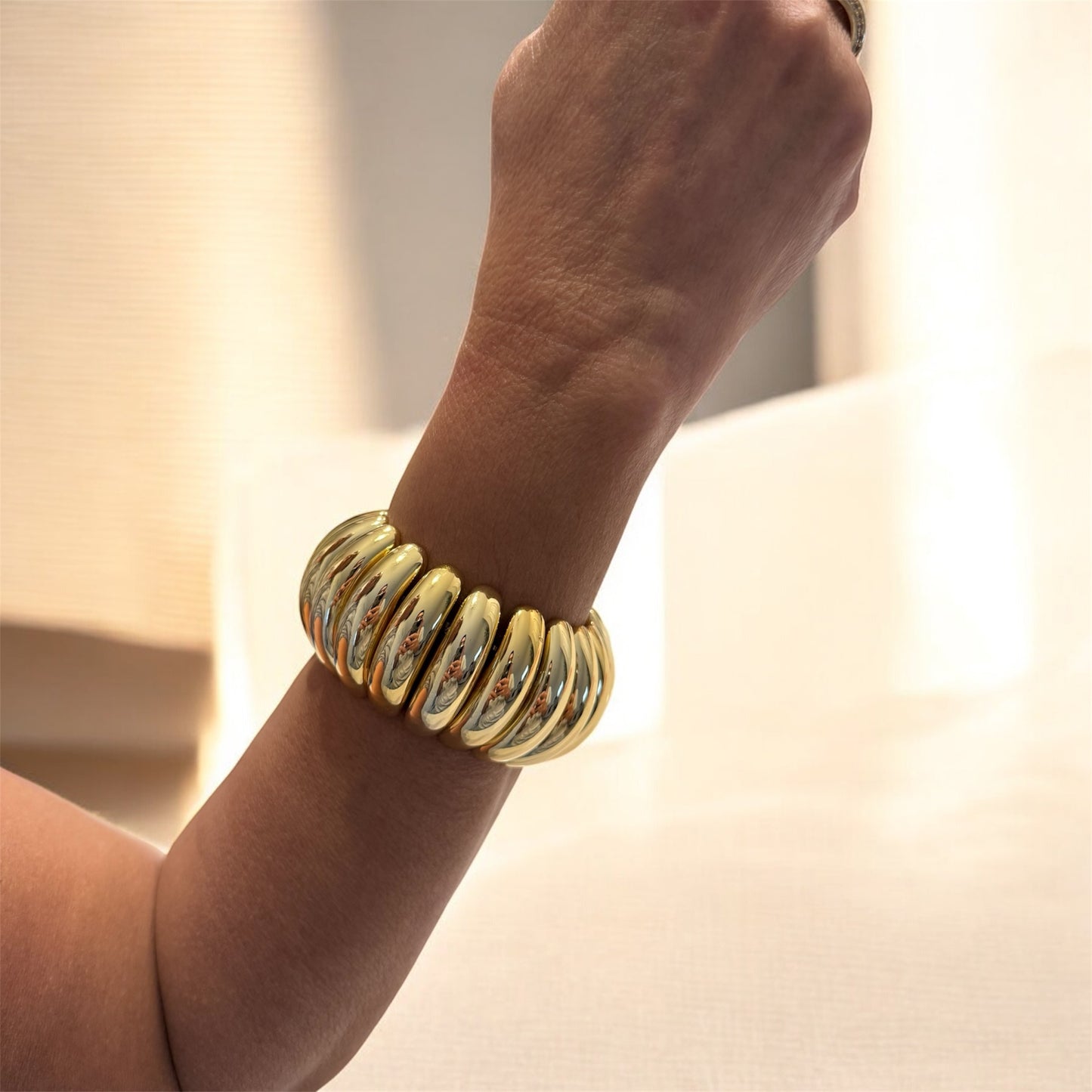 Gold impact bracelet