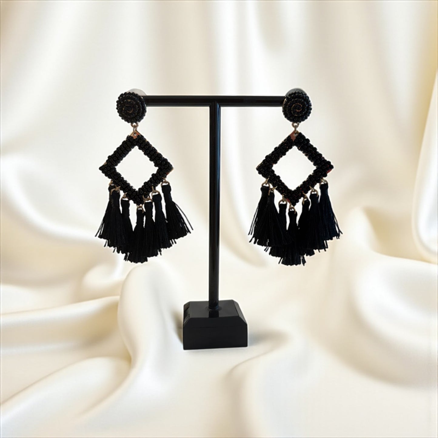 Black tassel drop earrings