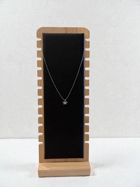 Silver bow necklace