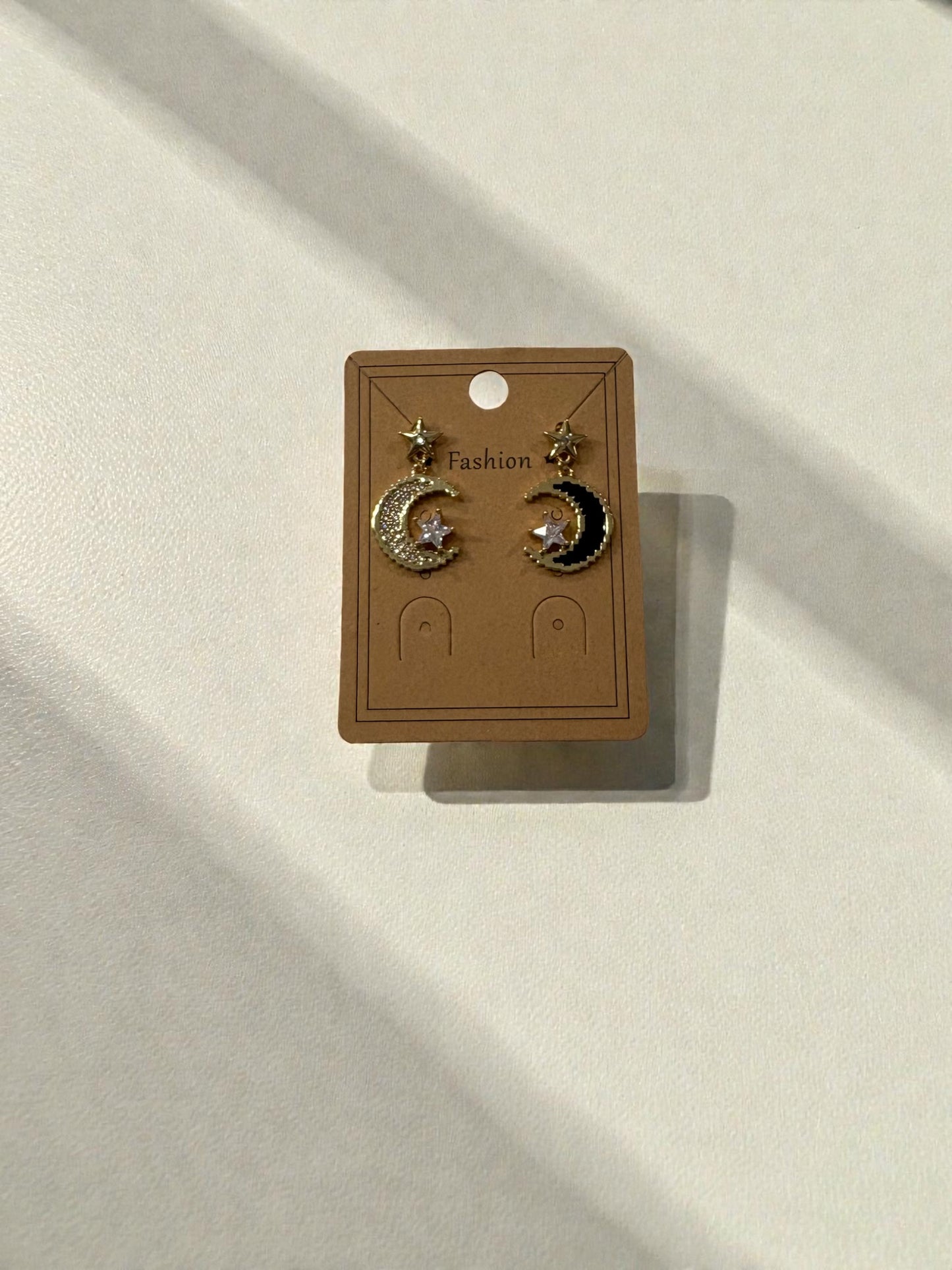 Contrast moon earrings