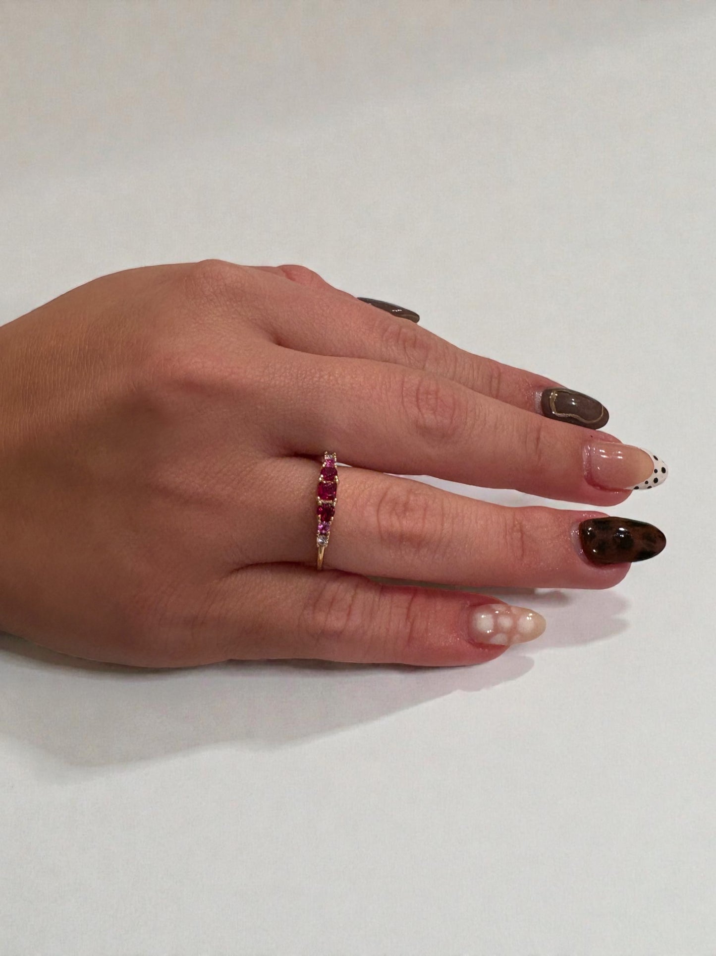 Delicate ruby trio ring